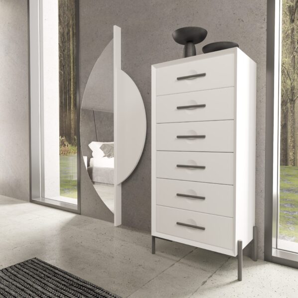 Dormitorio de estilo industrial con cabecero alto gris de líneas geométricas y mesitas blancas frente a pared de cemento.